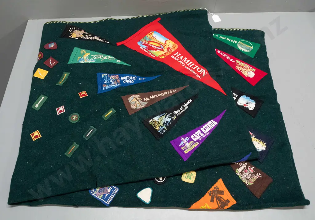 green woollen blanket with Onehunga label and numerous Boy Scouts and other badges, location pennants etc - some fading Image 1++