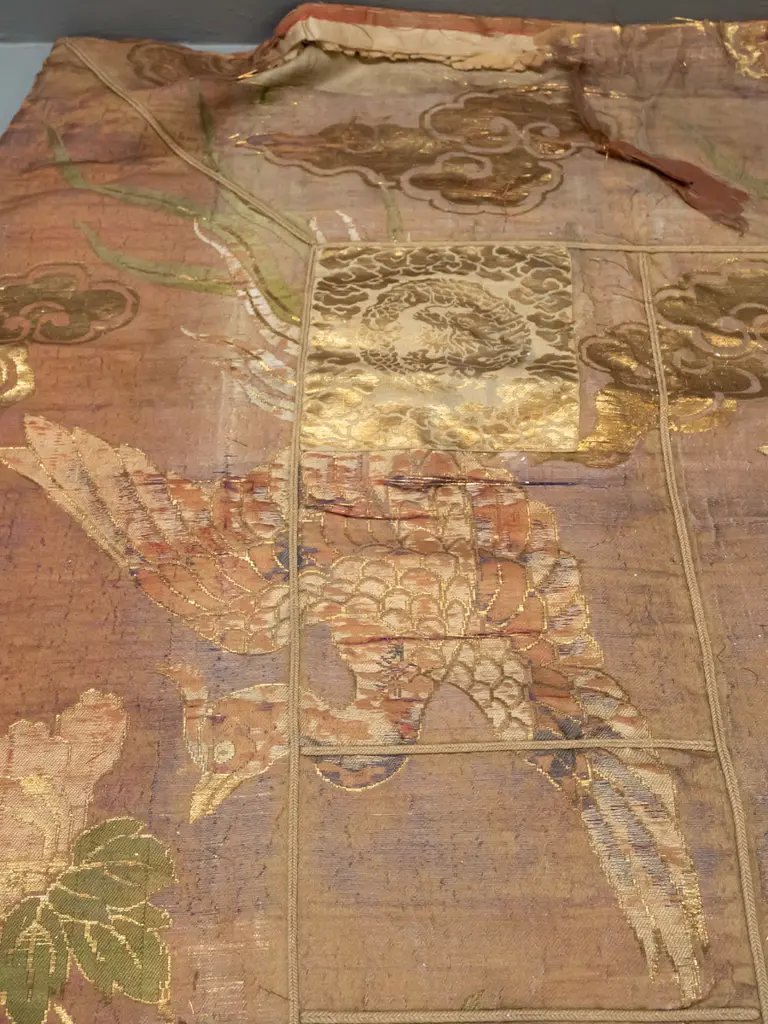 antique Japanese embroidered and lined fabric wall hanging with hanging rings along long edge - heron and applied mons Image 1++