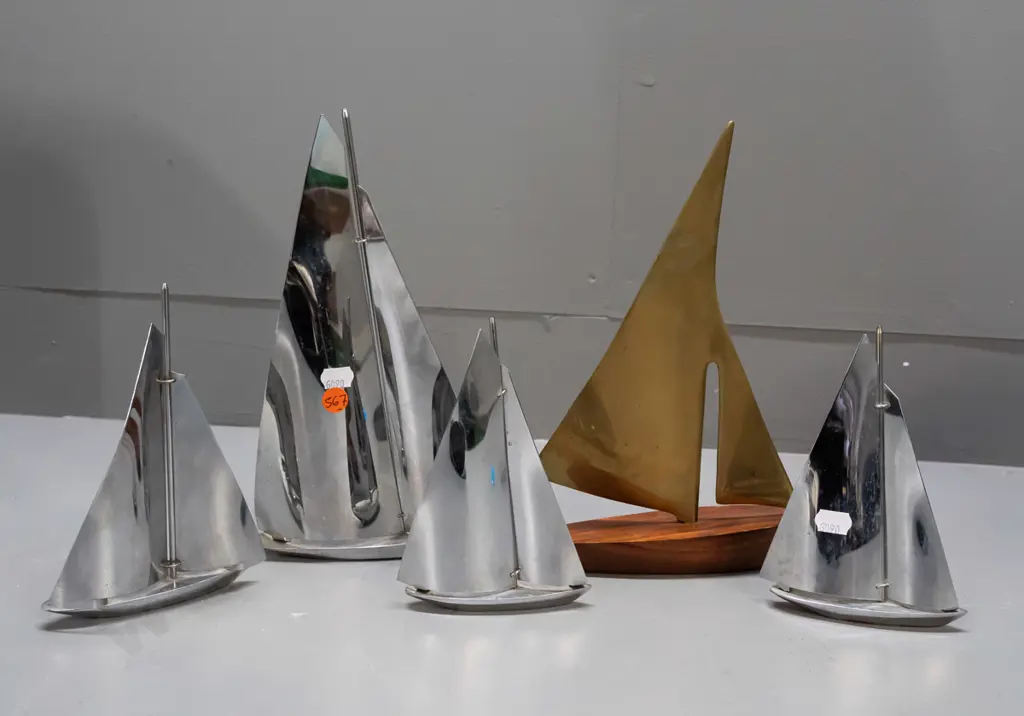 5 retro yacht models - 4 chrome & one teak with brass sails H-250 L-190. Minor pitting or corrosion to chrome. Image 1++