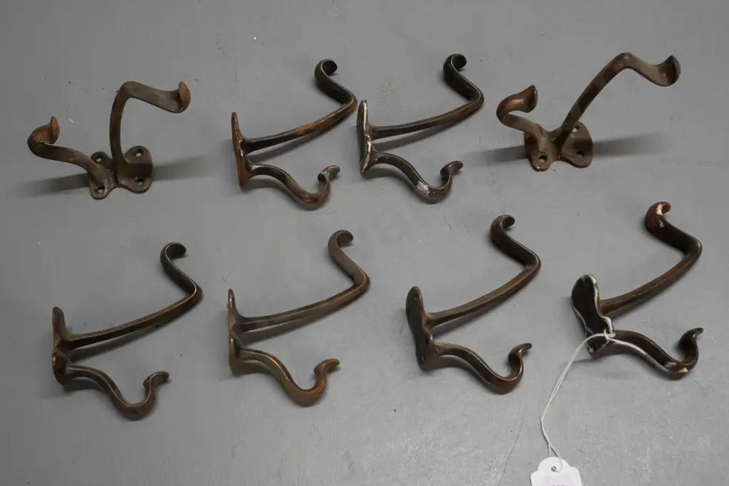 8 vintage cast metal copper finish double coat hooks - some wear and surface corrosion H-110 D-100 Image 1++