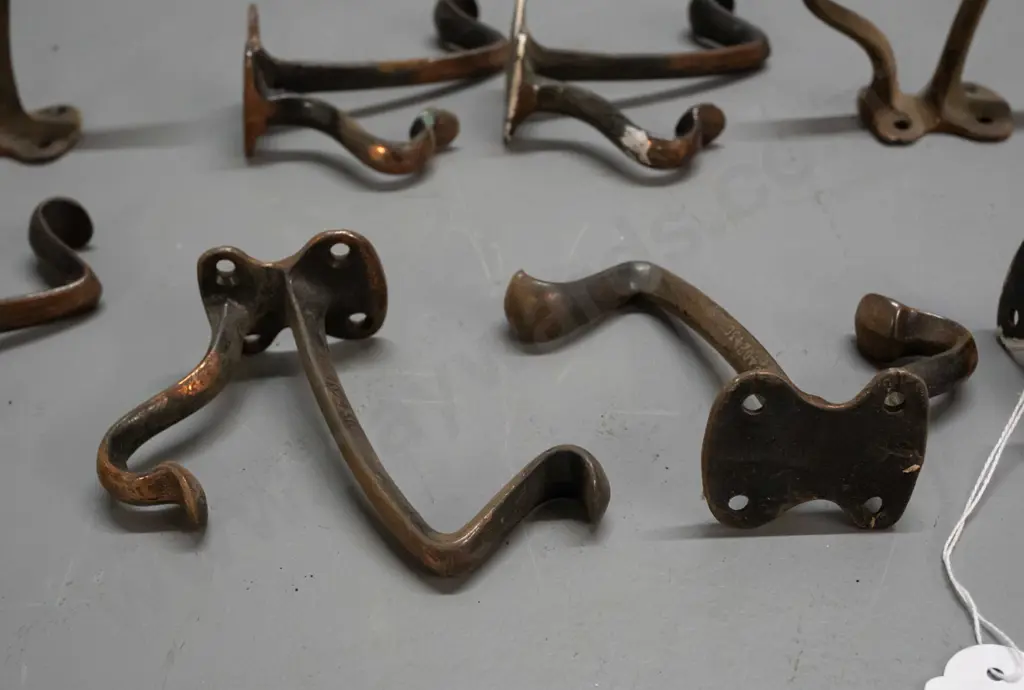 8 vintage cast metal copper finish double coat hooks - some wear and surface corrosion H-110 D-100 Image 1++