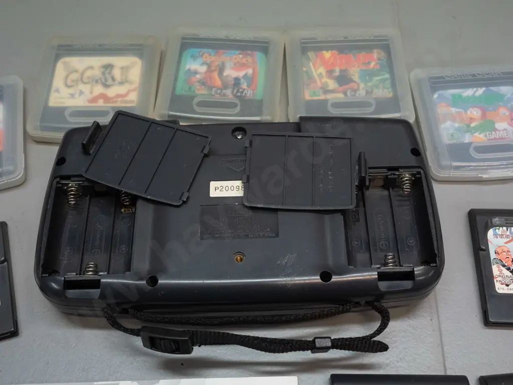 Sega Game Gear handheld game console with 9 games, 5 in plastic cases - untested Image 1++