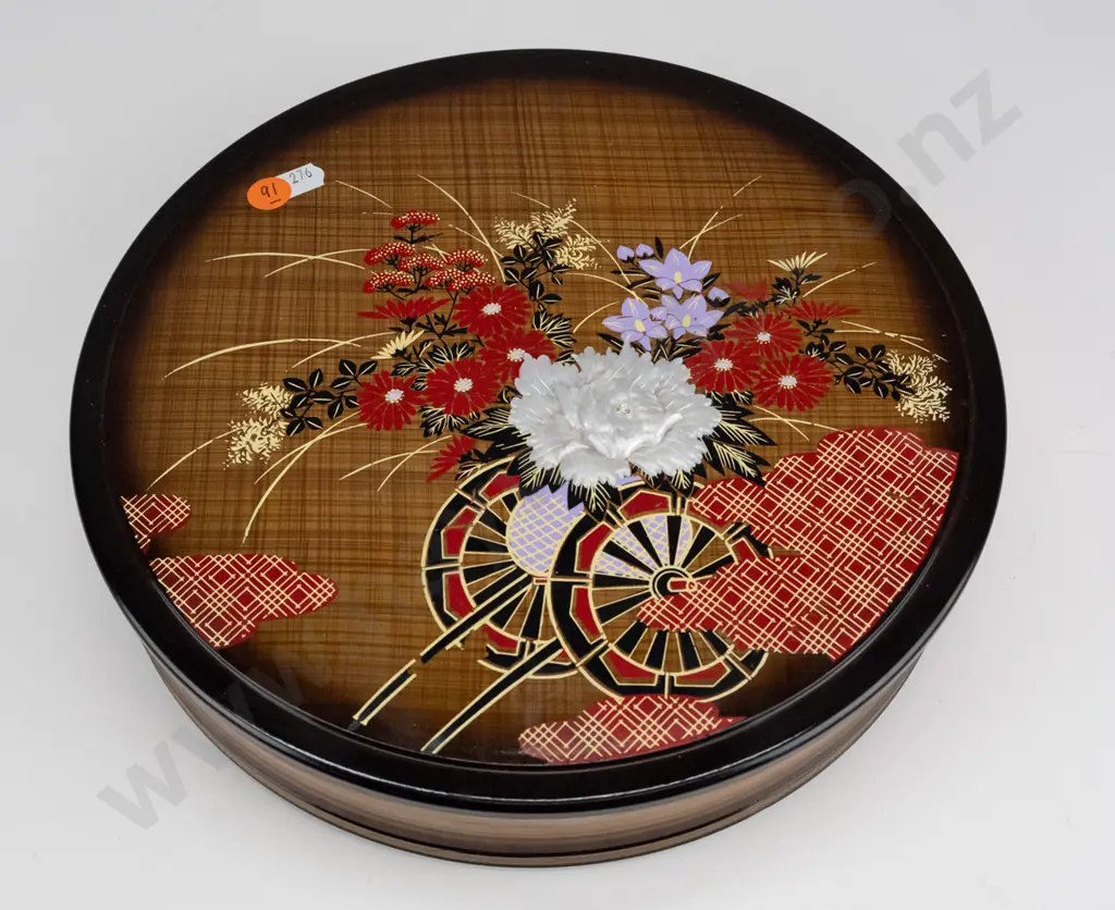 round lidded asian lacquer box with flower cart motif and relief flower - repaired chip to base Image 1++