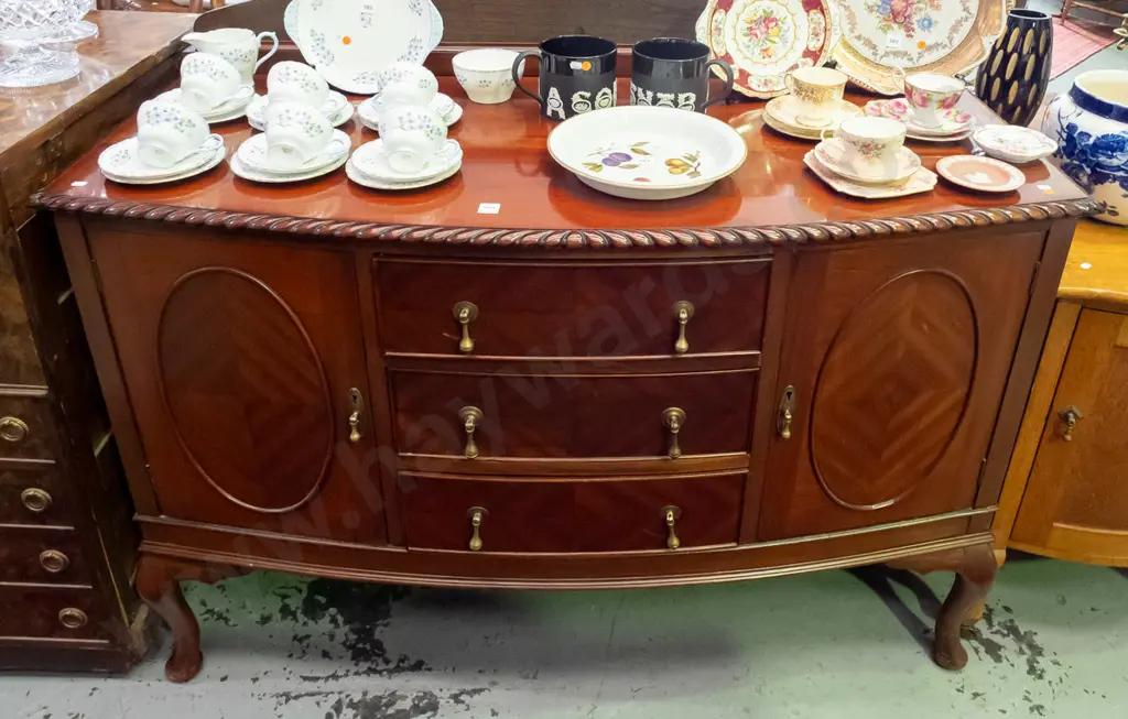vintage mahogany bow-front buffet sideboard with gadrooned edge, 3 drawers with brass drop handles, 2 doors, quartered Image 1++