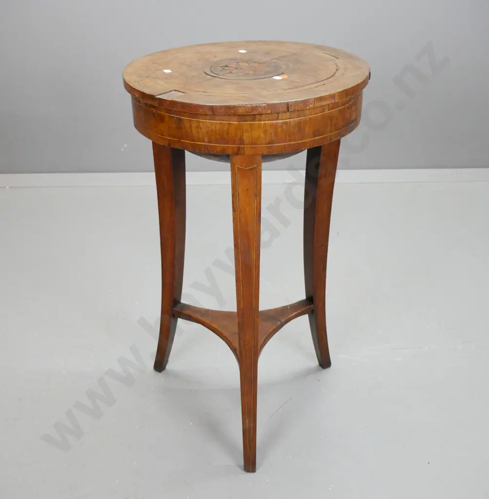 restorer's early Victorian mahogany round-top work table on 3 square section tapering legs, lower platform. Image 1++