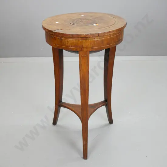 restorer's early Victorian mahogany round-top work table on 3 square section tapering legs, lower platform.