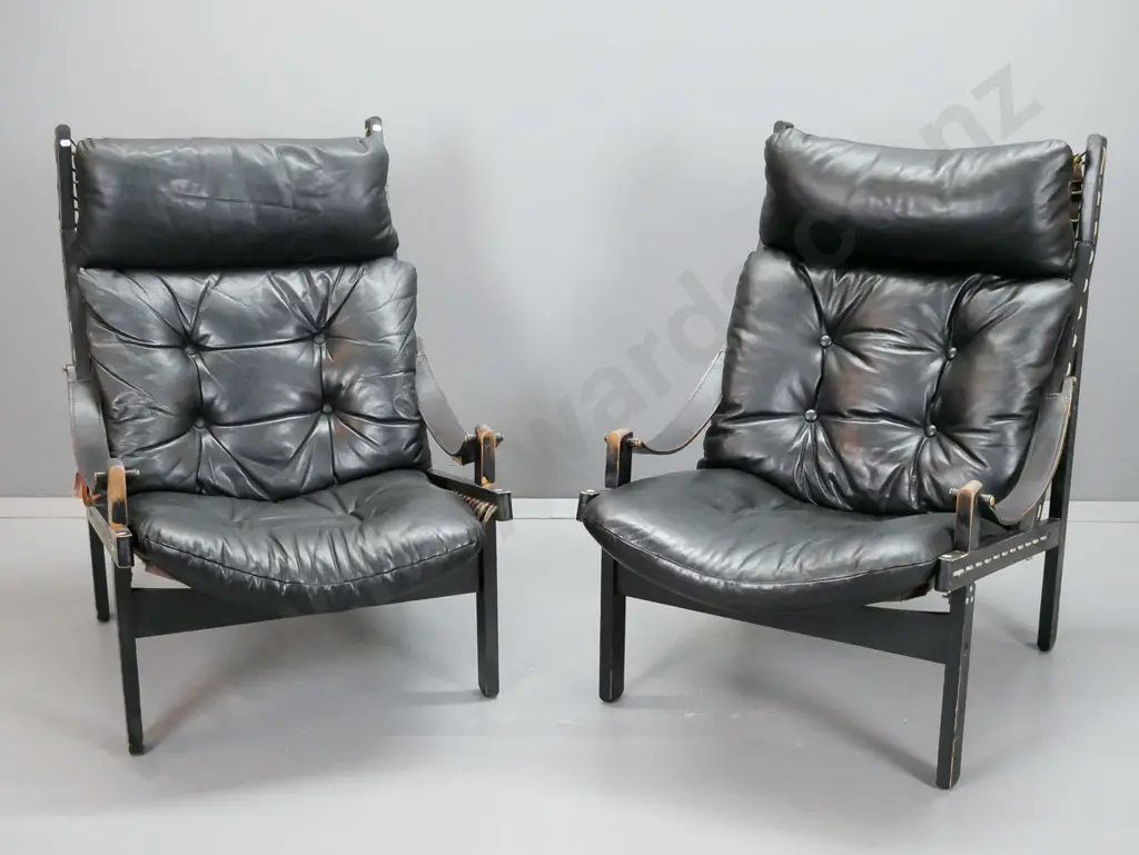 pair of retro timber and black leather slung back lounge chairs with canvas seat and back strung through frame, leather Image 1++