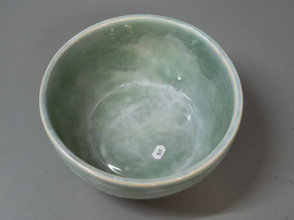 (Crown Lynn?) bowl with hard to read (J8, 38?) mark and 15/5 fraction mark. Overall crazing to celadon green over blue Image 1++