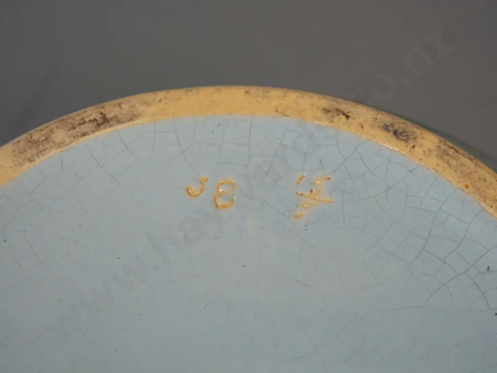 (Crown Lynn?) bowl with hard to read (J8, 38?) mark and 15/5 fraction mark. Overall crazing to celadon green over blue Image 1++
