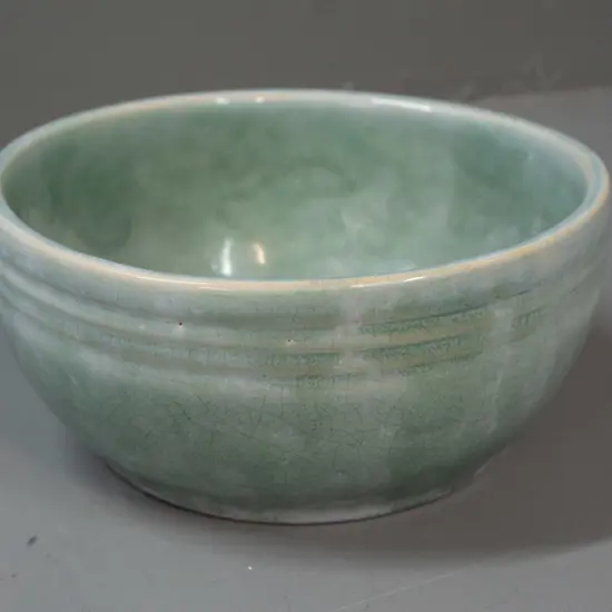 (Crown Lynn?) bowl with hard to read (J8, 38?) mark and 15/5 fraction mark. Overall crazing to celadon green over blue