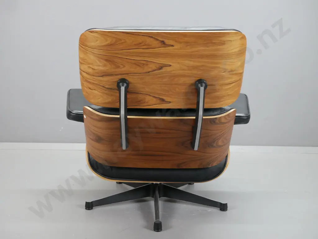 contemporary Eames-style swivel lounge chair with timber laminate shell, black leather seat, back & arms H810 W880 D700 Image 1++