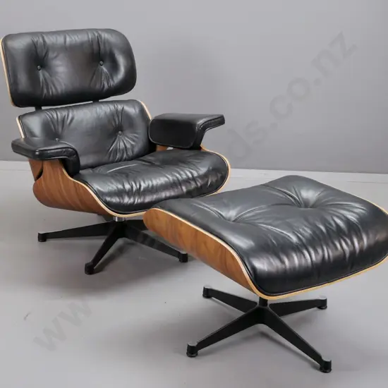 contemporary Eames-style swivel lounge chair with timber laminate shell, black leather seat, back & arms H810 W880 D700