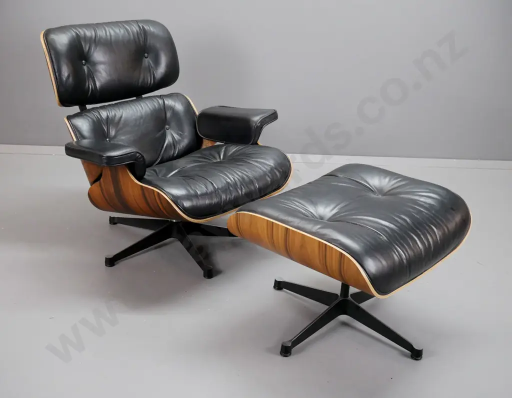 contemporary Eames-style swivel lounge chair with timber laminate shell, black leather seat, back & arms H810 W880 D700 Image 1++