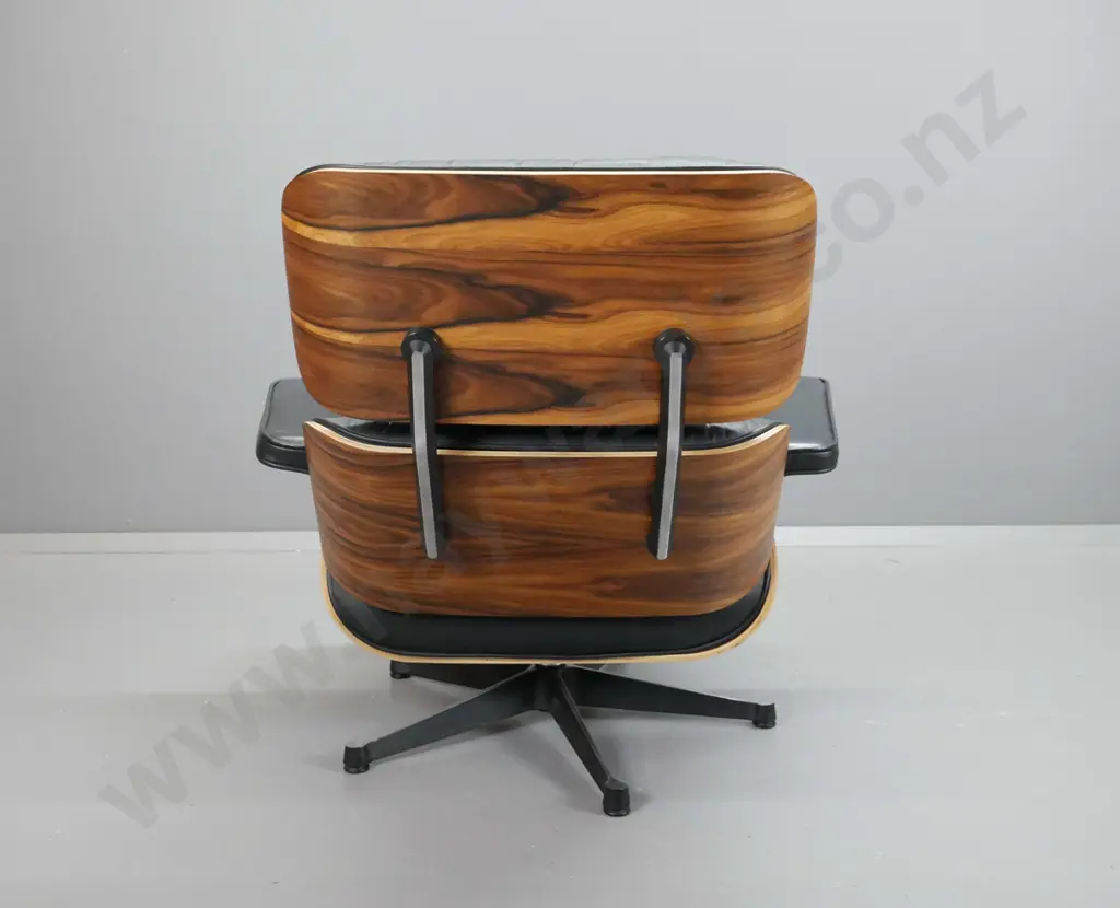 contemporary Eames-style swivel lounge chair with timber laminate shell, black leather seat, back & arms H810 W880 D700 Image 1++