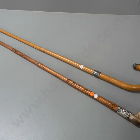 2 walking sticks - bent wood cane with band & end cap marked "Silver" and bamboo? with angled antler handle, sterling