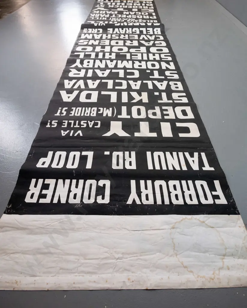 very long Dunedin fabric bus blind - white on black lettering, some staining / discolouration in a few areas. Image 1++