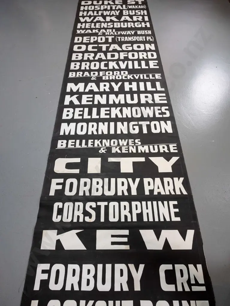 very long Dunedin fabric bus blind - white on black lettering, some staining / discolouration in a few areas. Image 1++
