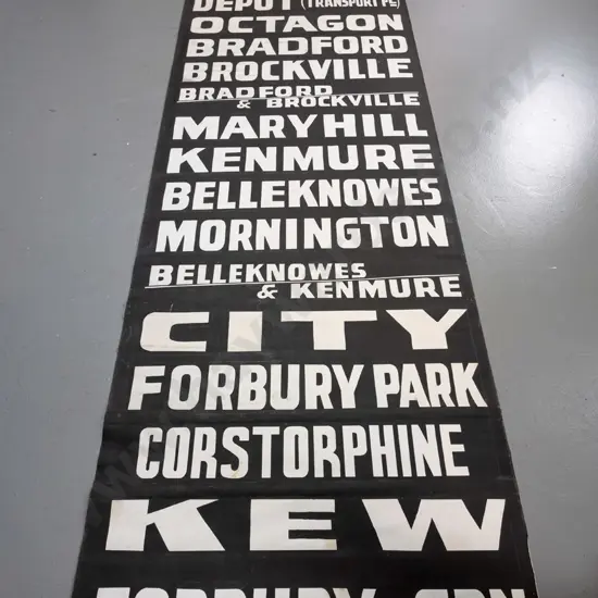 very long Dunedin fabric bus blind - white on black lettering, some staining / discolouration in a few areas.