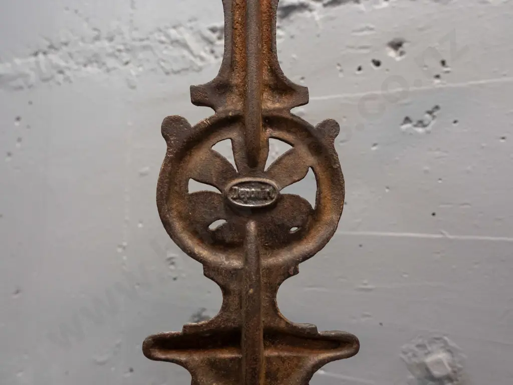 ornate cast metal umbrella stand with dolphins and child with umbrella motifs, 2 piece, both marked "Deponirt" - back Image 1++