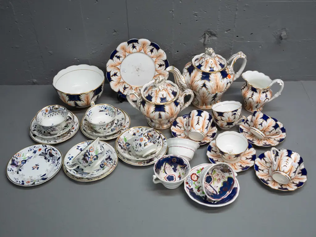 assorted early Victorian china teaware in 3 patterns including cups & saucers, teapot, lidded sugar, plates, etc. Teapot Image 1++