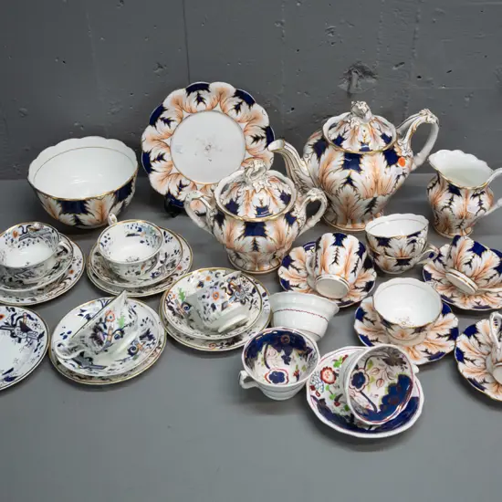 assorted early Victorian china teaware in 3 patterns including cups & saucers, teapot, lidded sugar, plates, etc. Teapot