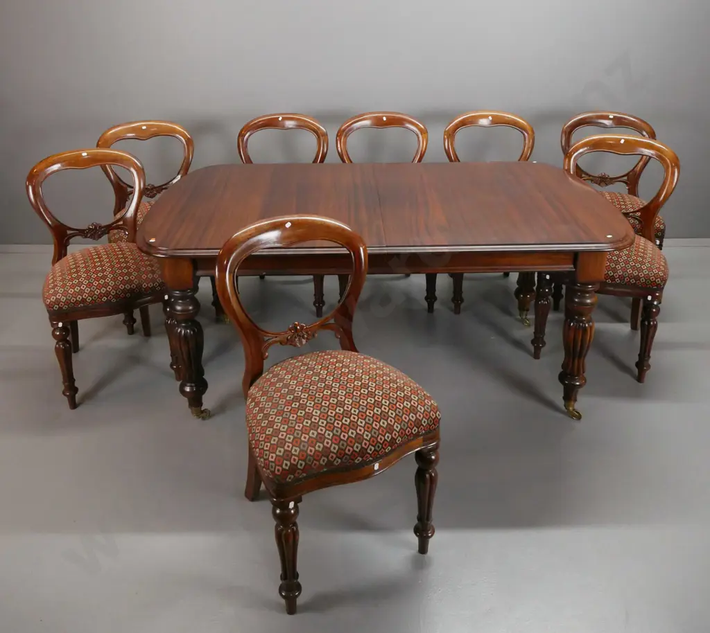 reproduction Victorian style mahogany dining table with turned and fluted legs, large brass cup casters, wind out handle Image 1++