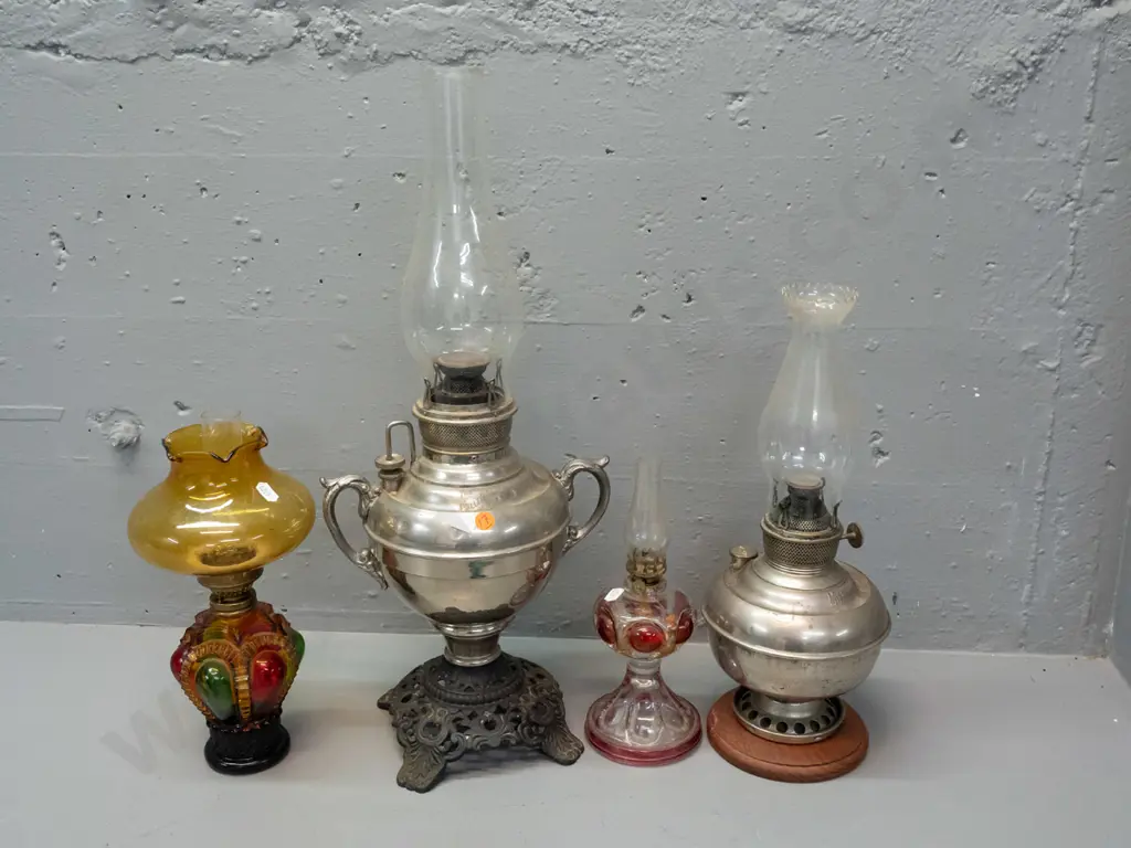 4 kerosene lamps: 2 Miller USA, larger one with dents, other w/ timber base added, and 2 coloured glass, all with clear Image 1++