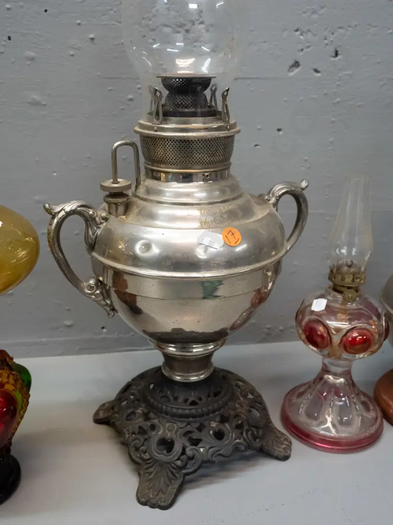 4 kerosene lamps: 2 Miller USA, larger one with dents, other w/ timber base added, and 2 coloured glass, all with clear Image 1++