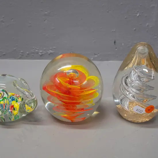 3 art glass paperweights - elephant, teardrop with spiral H-120 and a globe shape with Murphy's NZ label