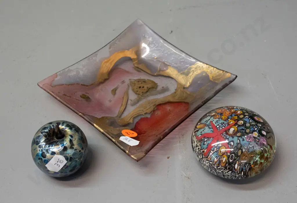 3 art glass items - paperweight with undersea motif, Isle of Wight glass apple and a small square dish 130 x 130 Image 1++