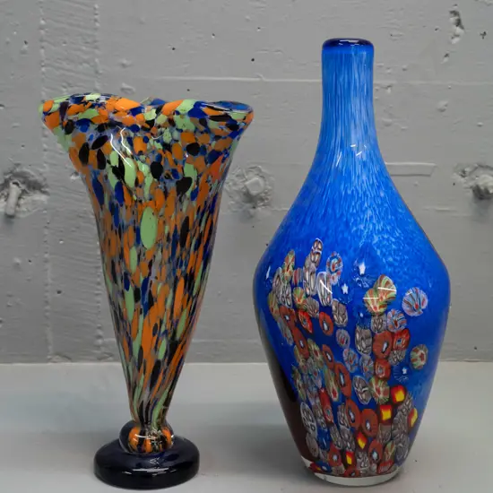2 heavy art glass vases - blue & red bottle vase with millefiore and yellow swirl decoration, and a multi colour with