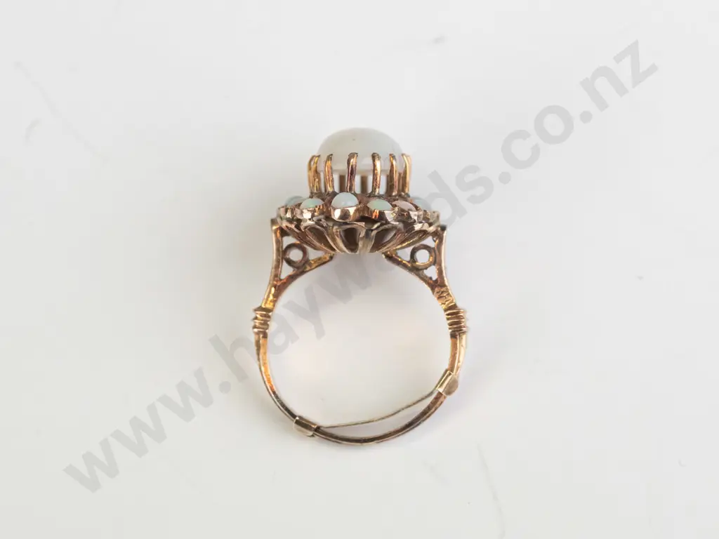 1 opal cluster ring 14ct gold 4.7grams centre raised opal surrounded by 14 round carbon cut small opals 2.3mm Image 1++