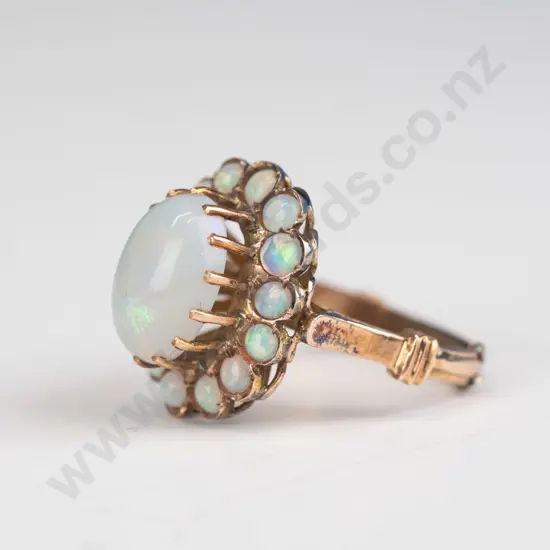 1 opal cluster ring 14ct gold 4.7grams centre raised opal surrounded by 14 round carbon cut small opals 2.3mm