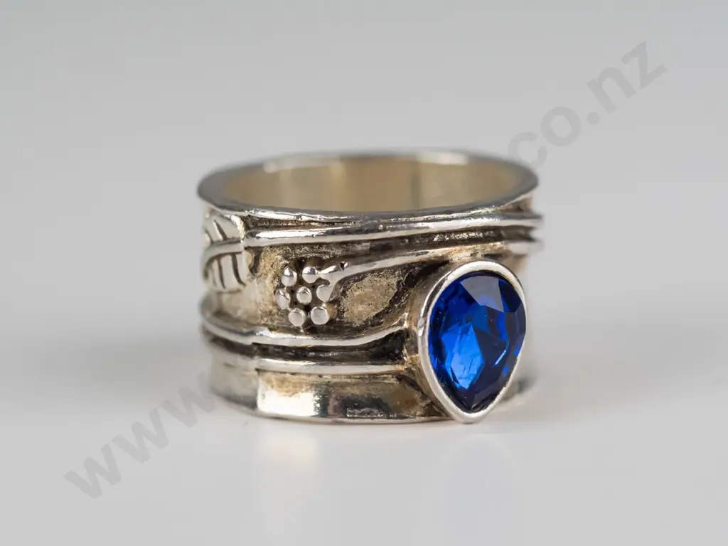silver ring with blue stone stamped 750 & 925 - size 17 1/4 Image 1++