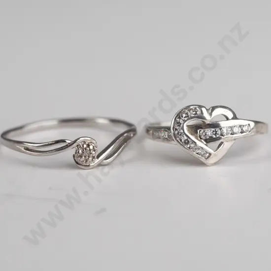 2 silver rings both stamped 925 [heart ring bit mishapen]