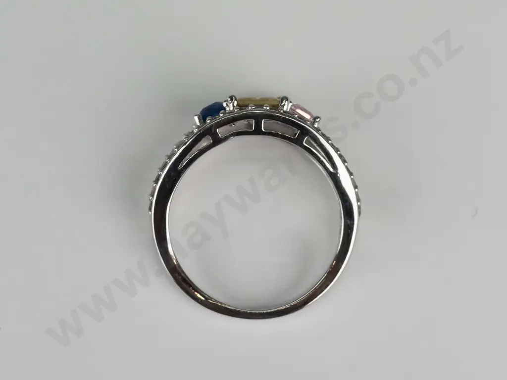 silver dress ring with blue, yellow & pink stones stamped S925 Image 1++