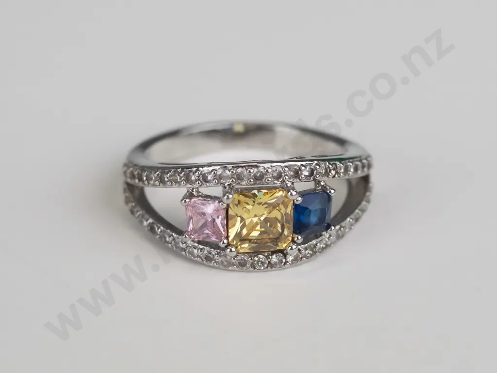 silver dress ring with blue, yellow & pink stones stamped S925 Image 1++