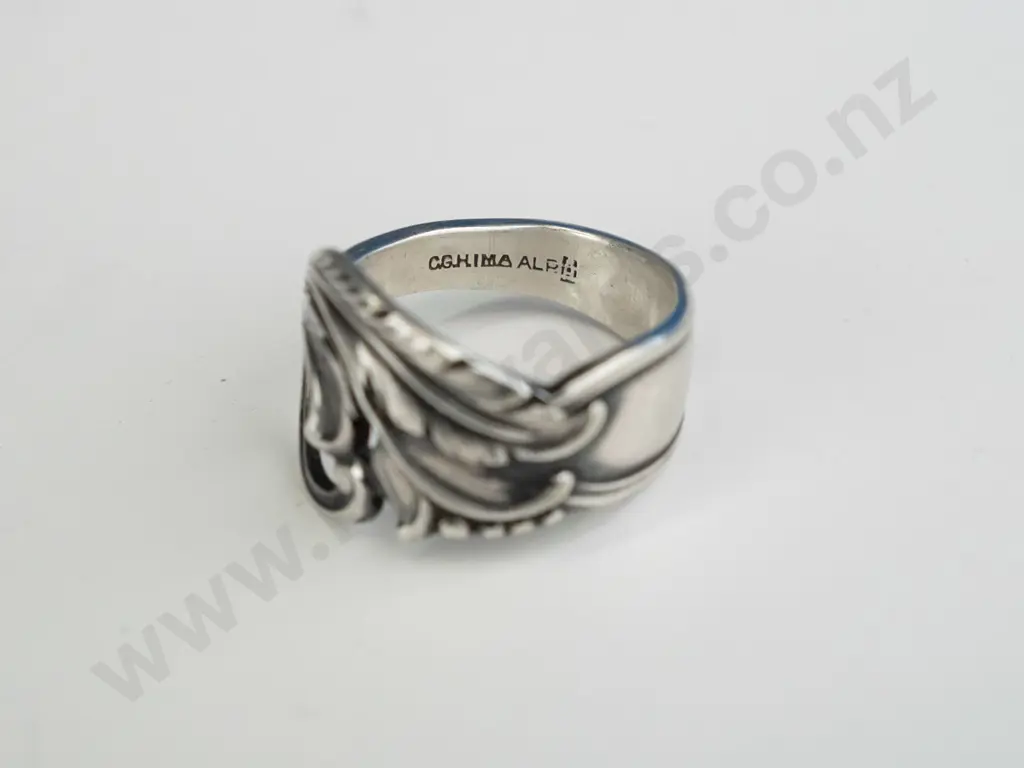 plain silver band stamped 925 & silver ring with leaf swirl no mark Image 1++