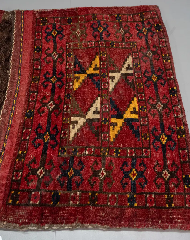 hand knotted wool Persian style saddle bag - geometric pattern red, dark blue, saffron etc - some wear to bottom edges Image 1++