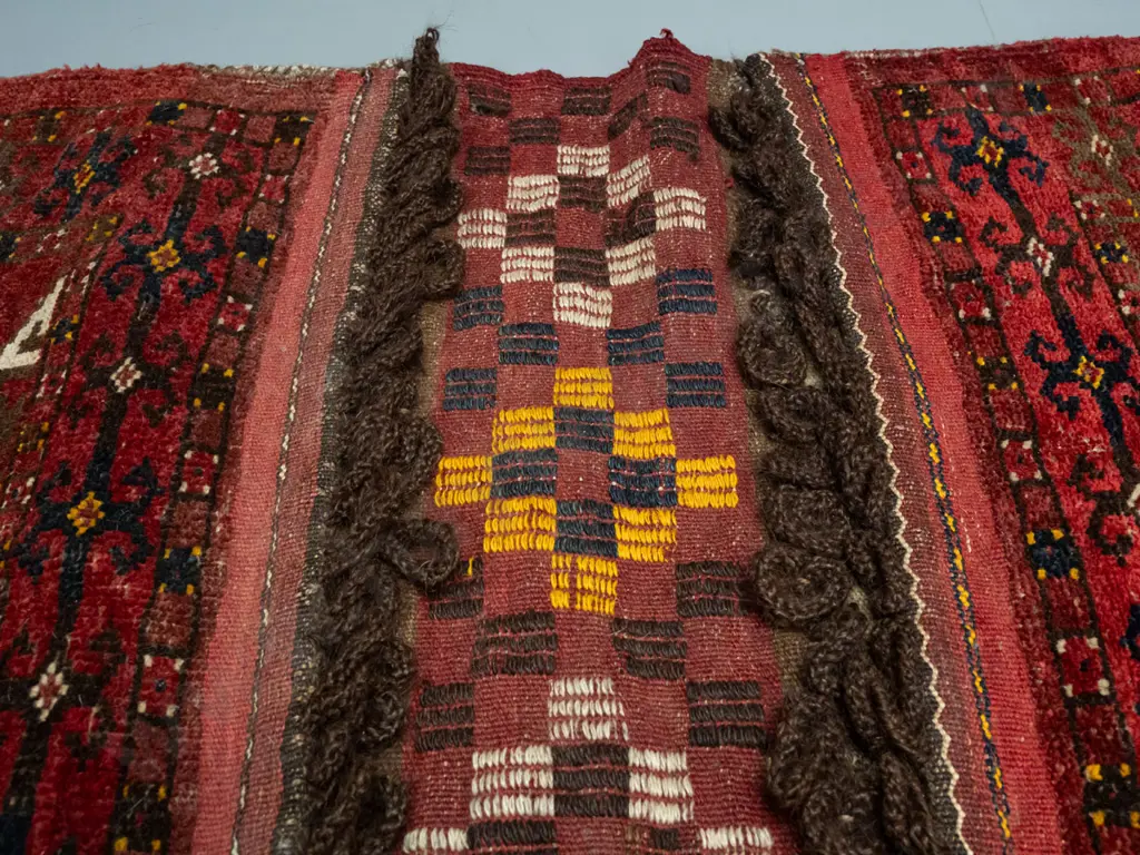 hand knotted wool Persian style saddle bag - geometric pattern red, dark blue, saffron etc - some wear to bottom edges Image 1++