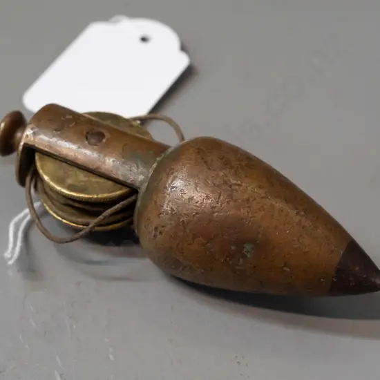 vintage brass plumb bob with wheel - general age wear L-90