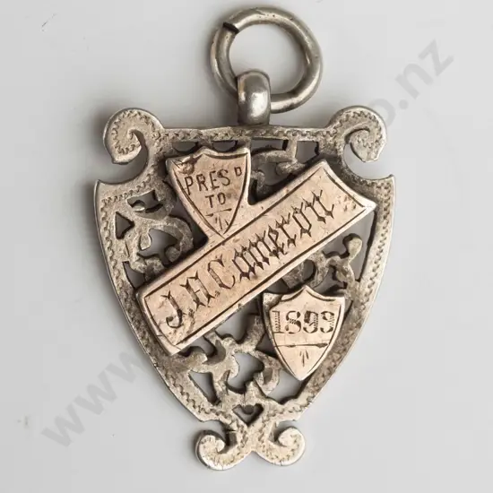 silver medal 'WCS 1st Foptballers Race' presented toJ H Cameron 1895
