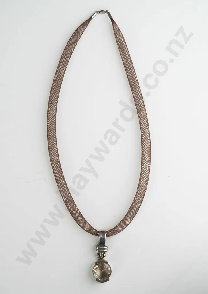 silver necklace with light amber coloured stone on mesh clasp stamped 925 Image 1++