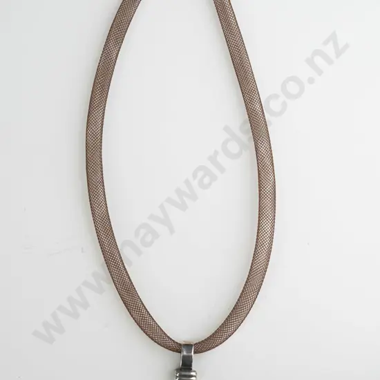 silver necklace with light amber coloured stone on mesh clasp stamped 925