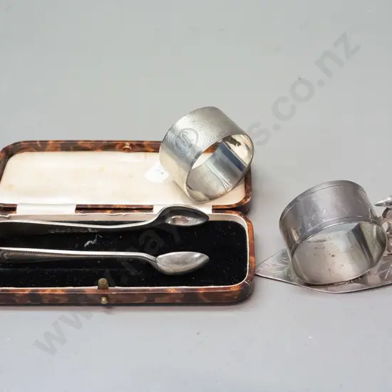 napkin ring with leaf & kangaroo marked Stg Silv, a hallmarked sterling napkin ring and pair of plated sugar tongs