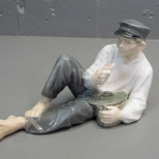 Royal Copenhagen figure - reclining boy No. 865 H-110 L-195