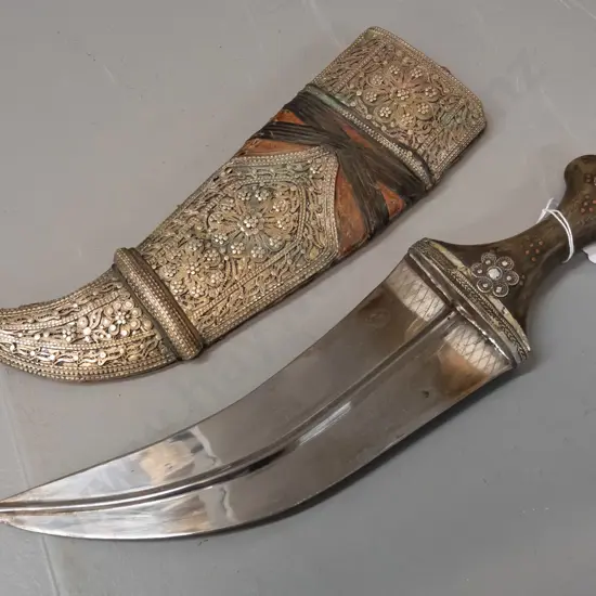 ornate Jambiya / dagger from Sadaa Yemen with horn handle with white metal and copper stud decoration, leather sheath w/