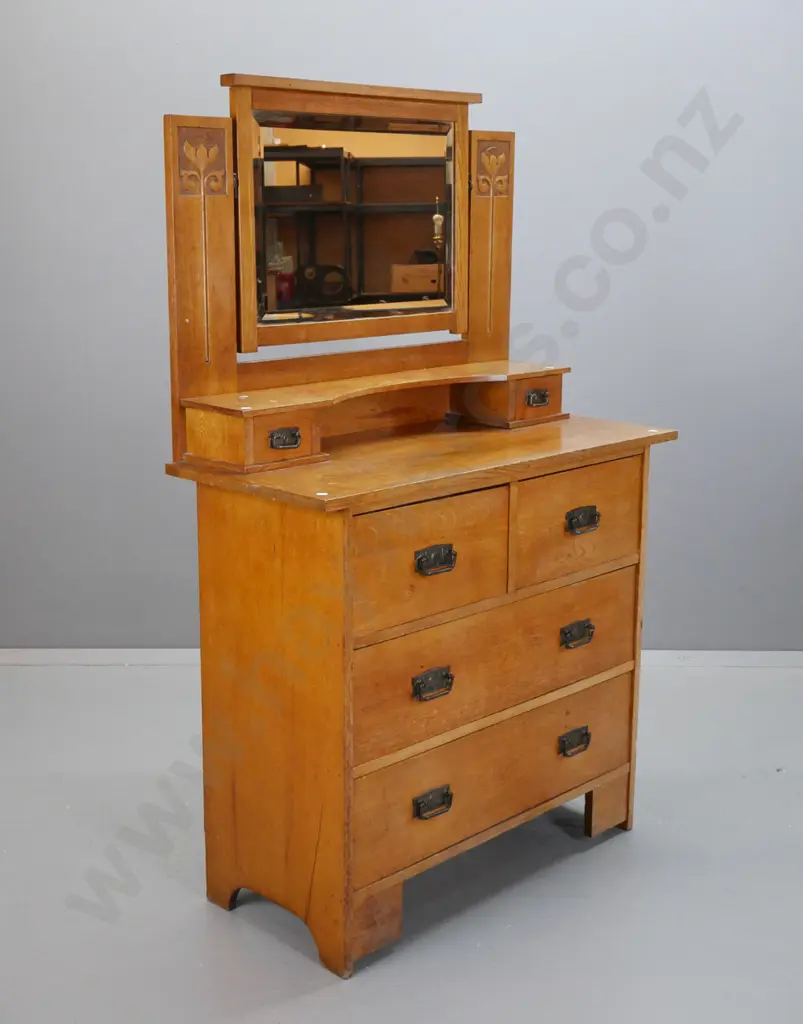 art nouveau oak dressing table w/ bevelled edge mirror, carved supports, over shelf and 2 small drawers, 4 lower drawers Image 1++