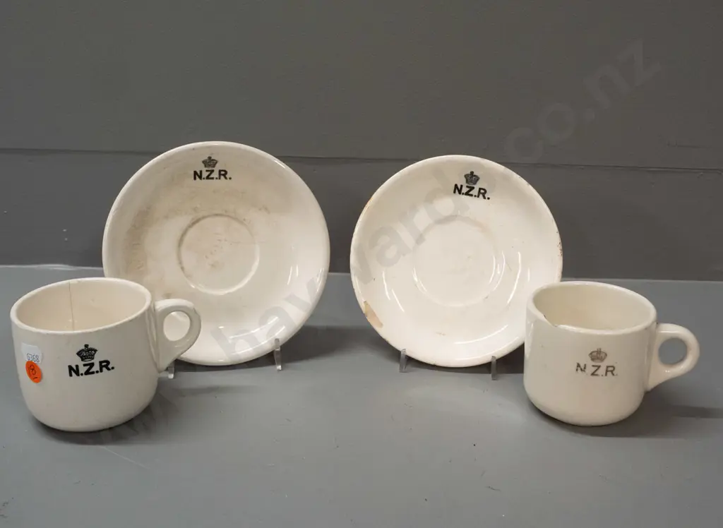 New Zealand Railways logo crockery - Crown Lynn mug and 2 saucers and a Temuka mug - all with staining and chips. Image 1++