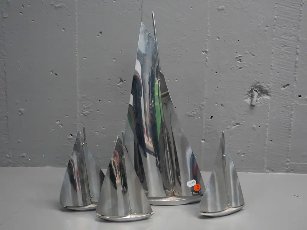 4 ornamental chrome yachts - largest one has some corrosion at base of mast H-360 L-180 Image 1++